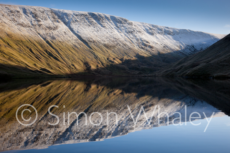 High Street reflected in Hayeswater near Hartsop, Lake District,